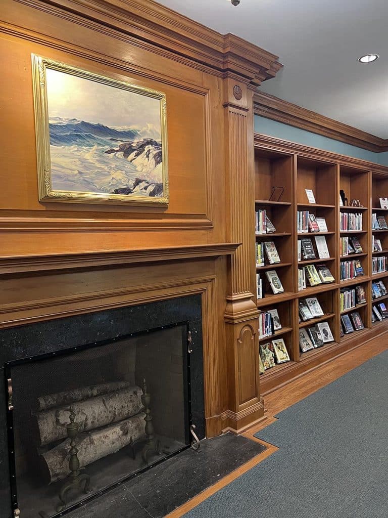 Bronxville Public Library fireplace and bookshelves