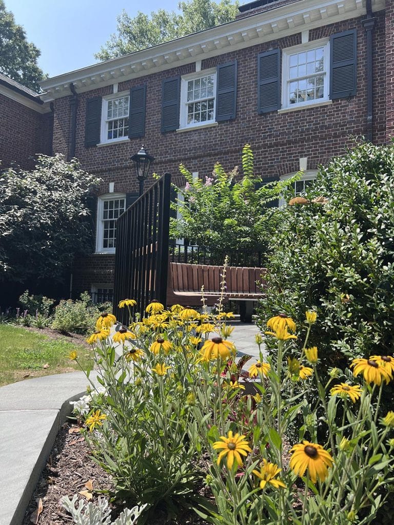 Bronxville Public Library exterior with flowers