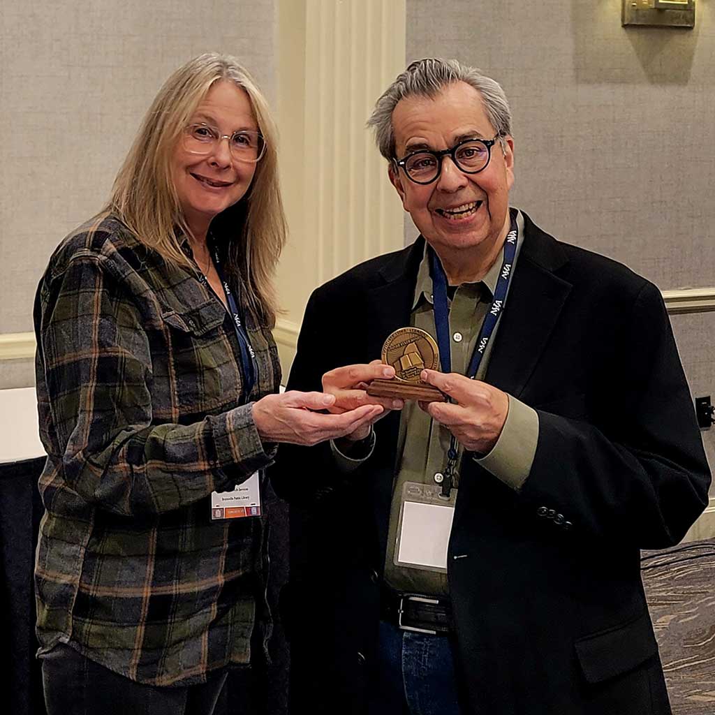 Ellen McTyre, our youth services librarian, and Chair of the Empire State Award (ESA) Committee, was honored to present the 2025 Empire State Award